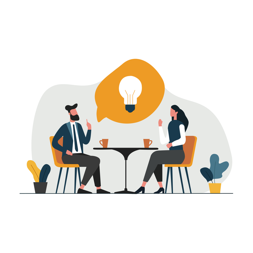 Illustration: a man in a dark jacket and a woman in a navy vest sit across a small round table with two cups of coffee, talking, with an orange speech bubble holding a white light bulb above them, between two potted plants